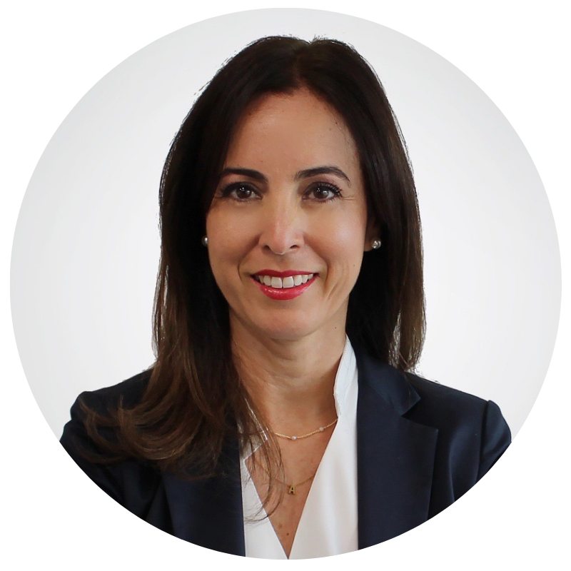 leadership team member headshot of a lady with brown hair, brown eyes, smiling into the camera