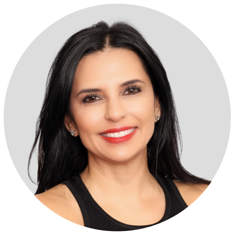 leadership team member headshot of a lady with brown hair, brown eyes, smiling into the camera
