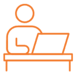 icon of a person sitting at a desk in front of a laptop