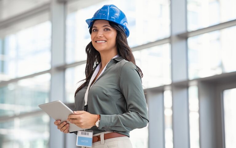 Architect working on digital tablet at construction site
